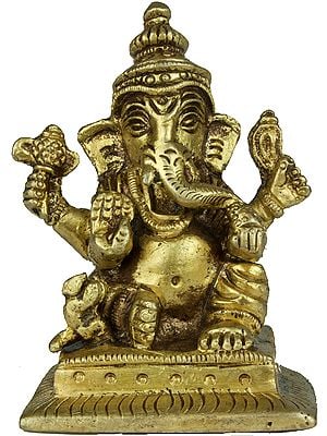 Lord Ganesha Enjoying Modak (Small Statue)