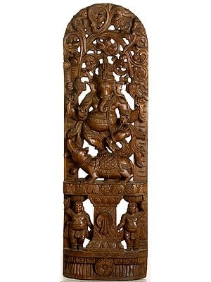 Four Armed Ganesha Dancing on Rat in the Backdrop of Floral Aureole