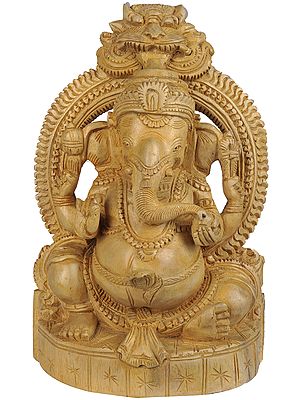 Four Armed Seated Ganesha with Flaming Aureole and Kirtimukha Atop