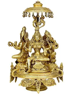 17" The Great Trinity of Ganesha, Lakshmi and Saraswati Seated on Moving Chowki with Parasol In Brass | Handmade | Made In India