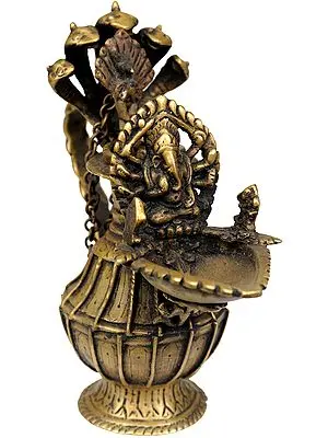 Lord Ganesha Lamp with Five-Hooded Serpent Handle, Oil Bowl and Peacock Spoon