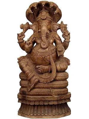 Lord Ganesha Seated on the Coils of A Serpent