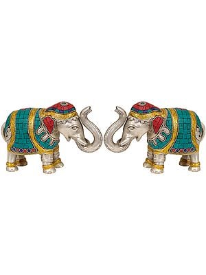 Elephant Pair with Upraised Trunks