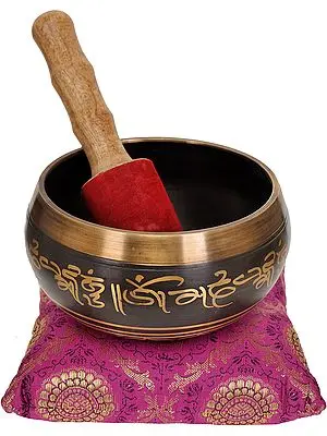 Singing Bowl with the Figures of Buddha Inside and Mantras Outside