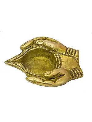 Diya Placed in Welcoming Hand