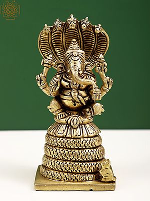 4" Small Four-Armed Ganesha Seated on Five-Hooded Serpent In Brass