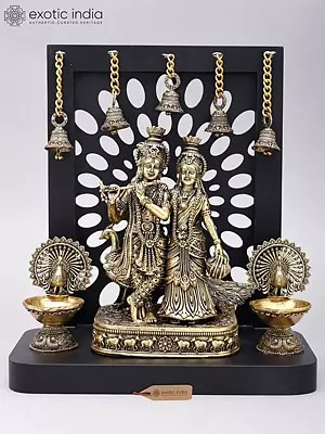 12" Superfine Divine Pair of Radha Krishna with Peacock Lamps and Bells | Brass Statue with Designer Wood Frame