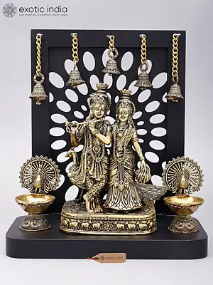 12" Superfine Divine Pair of Radha Krishna with Peacock Lamps and Bells | Brass Statue with Designer Wood Frame