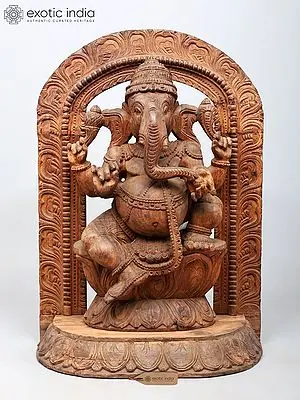 Large Wood Carving: Four Armed Ganesha Seated on Lotus