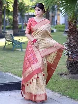 Zari Woven Pallu And Patola Design Festive Wear Raw Silk Saree With Tassels Pallu