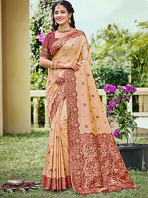 Pink Silk Saree with Intricate Floral Border and Tassels