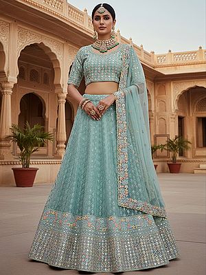 Heavy Mono Net Lehenga Choli With Dupatta Features Multi Threads Sequins Embroidery And Silver Stone Embellishment