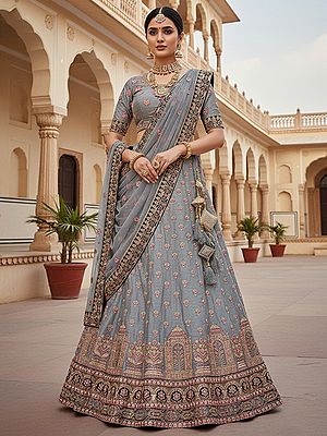 Dupion Silk Lehenga Choli With Heavy Mono Net Dupatta Showcases Multi Threads Embroidery And Swarovski Embellishment For Bridal