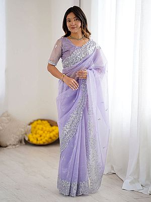 Stunning Art Silk Saree Showcasing Intricate Designer Embroidery And Shimmering Silver Border Accents
