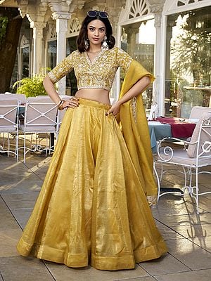 Saffron-Mango Vichitra Silk Solid Attractive Lehenga Choli With Sequins And Embroidered Matching Dupatta