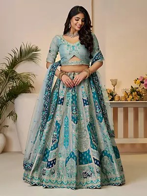 Embellished Embroidery And Sequins Work Banarasi Silk Wedding Wear Lehenga Choli With Soft Net Dupatta