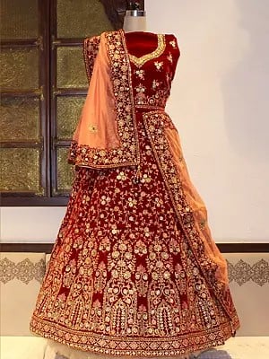 Velvet Zari, Cord And Sequins Embroidery Work Bridal Lehenga Choli And Net Tassels Dupatta