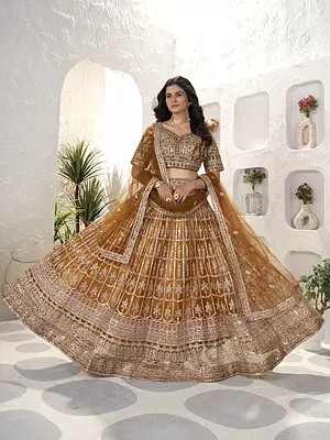 Embroidery And Sequins Work Elegant Wedding Wear Net Lehenga Choli