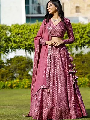 Heavy Sequins Work Faux Georgette Lehenga Choli With Tassels For Wedding Occasion