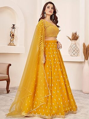 Saffron-Yellow Small Butti Georgette Lehenga Choli And Dupatta With Zari Embroidery And Sequins