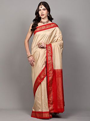 Shifting-Sand Saree and Contrast Temple Border with Zari woven Peacocks from Bangalore