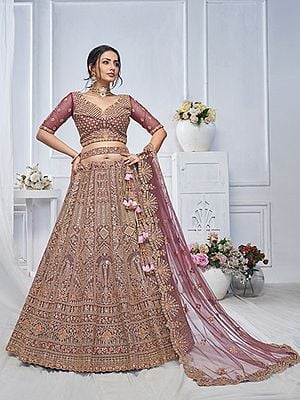 Soft Net Paisleys And Peacock Motifs Heavy Embroidery Work Party Wear Lehenga Choli With Dupatta