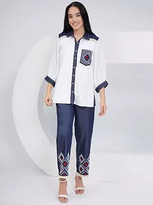 White Rayon Crepe Hand-Embellished Shirt Paired With Blue Denim Embellished Pants For A Chic Fusion Look