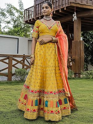 Yellow Premium Net Floral Butta Pattern Silk Embroidery Diamond Work Lehenga With Premium Silk V-Neck Choli And Dupatta