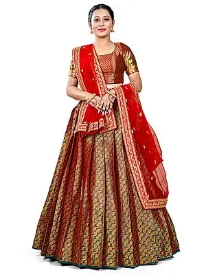 Green Color Art Silk Banarasi Half Saree Style Lehenga Choli with All-Over Zari Brocade and Red Dupatta