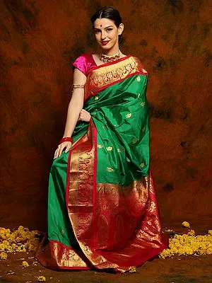 Emerald Green Kanjivaram Silk Saree with Magenta Border and Golden Traditional Motif Threadwork
