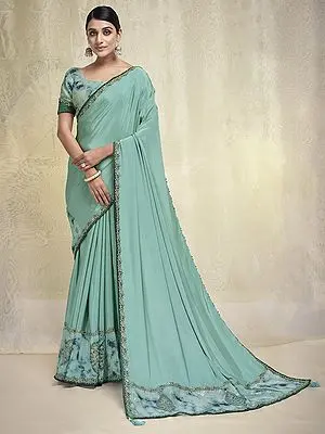 Aqua-Blue Crepe Silk Floral Embroidered Border Saree with Georgette Silk Blouse and Tassel Pallu