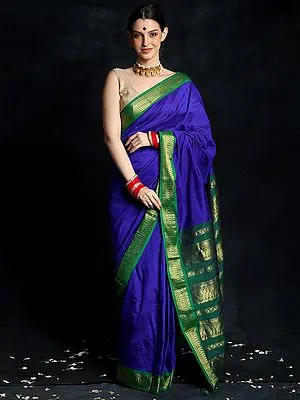 Royal Blue Plain Banarasi Silk Saree with Emerald Green Brocade Border and Palla