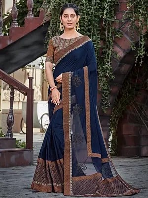 Navy Blue Colored Silk Embroidered Saree And Floral Motif In Border