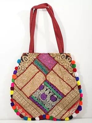 Patchwork Zari Embroidered Shoulder Bag with Pom Poms