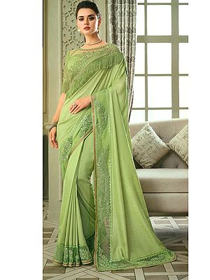 Exclusive Party Wear Elegant Silk Saree With Net Embroidered Border And Frills
