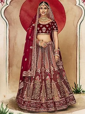 Oxblood-Red Velvet Bridal Lehenga Choli with Zari Floral Motif and Embroidery Dupatta