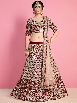 Oxblood-Red Velvet Silk Lehenga Choli With Zari Floral motif Dori-Sequin Work And Embroidered Dupatta