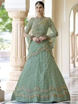 Pista Soft Net Ruffle Hem Lehenga Choli With All-Over Dori-Sequins Work And Scalloped Dupatta