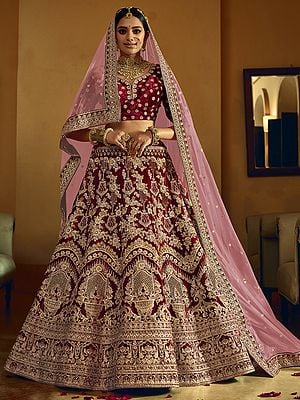 Rosewood Velvet Bridal Lehenga Choli With Mughal Motif Stone Dori Work And Designer Dupatta