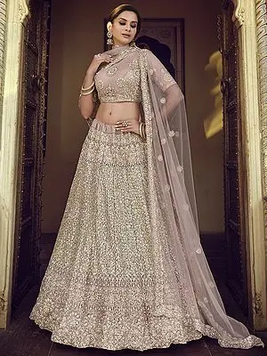 Mauve Soft Net Lehenga Choli with Embellished Sequins, Thread, Dori, Zari Work, And Scalloped Dupatta