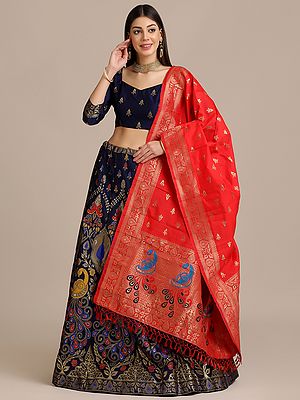 Navy-Blue Jacquard Silk Zari Woven Lehenga Choli With All-Over Multicolor Floral-Peacock Motif And Red Designer Dupatta