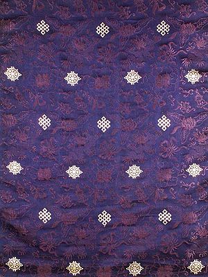 Tibetan Endless Knot and the Dharma Wheel