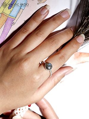 Sterling Silver Ring with Faceted Round Shaped Gemstone