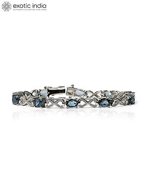 Faceted London Blue Topaz Infinity Bracelet