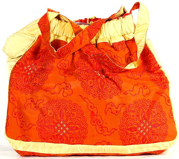 Amber and Crean Tibetan Endless Knot Banarasi Brocaded Handbag with Side Pockets