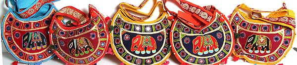Lot of Five Boat-Shaped Elephant Bags with Mirrors