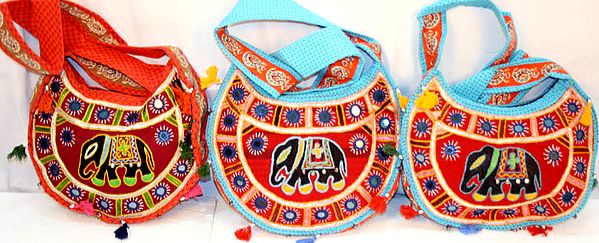 Lot of Three Boat-Shaped Elephant Bags with Mirrors