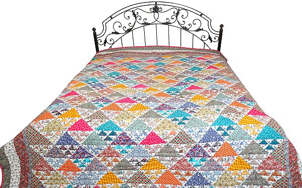 Multicolored Floral Printed Comforter from Dehradun with Triangular Patch-work and Kantha Stitch