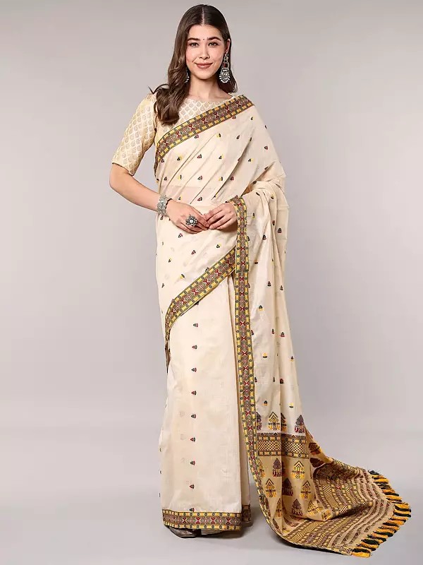 Woven Cream Saree Featuring Traditional Assamese Motifs and Patchwork Border