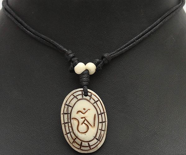 Carved Tibetan Om (AUM) Cord Necklace